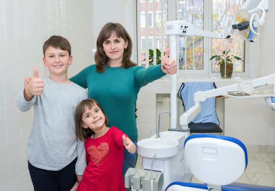 Family arriving at a dental clinic near North Manly